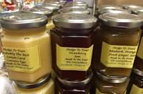 Image may contain: 1 person, candles and food, text that says "Hedge To Toast robably The Best Lemon Curd Contains the Eggs Made in cebook: Hedge to Toast Dales Hedge Το Toast Strawberry Jam Made in the Dales Tel; 07974568009 Facebook: Hedge to Hedge Το Toast Rhubarb, Orange Fresh Ginger Jam Made in the Dales Tel; acebook: 07974568009 Hedge to Το Hedge Hedge Το Toast Rhubarb, Oranal"